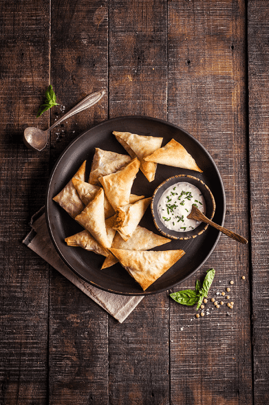 Empanaditas de masa filo rellenas con lentejas Iansa Agro, zapallo y curry