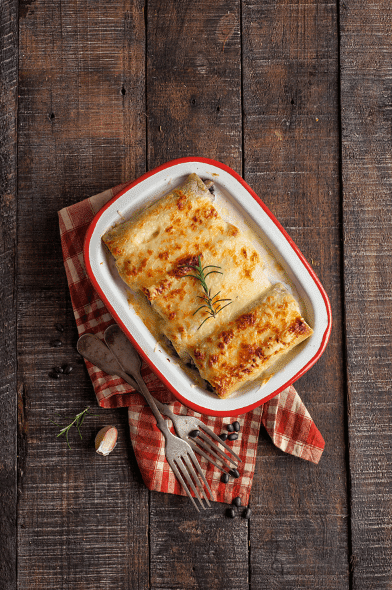 Canelones con salsa blanca, champiñones y porotos negros Iansa Agro
